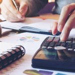 family member calculating costs for assisted living facility